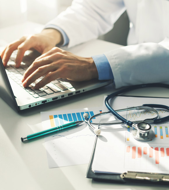 doctor working on finances